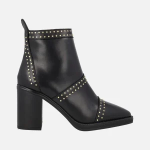 Botines de tacón Camden en piel negra con tachas doradas
