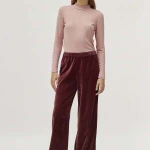 Top cuello mock rosa