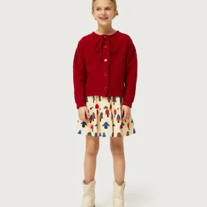 Cárdigan de niña con lazada rojo