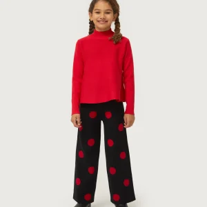 Pantalón de niña de punto jacquard estampado de lunares rojos