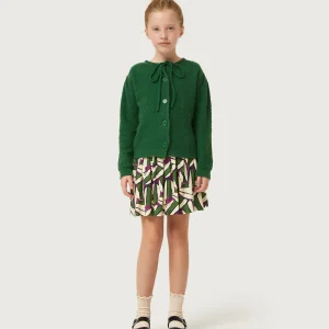 Falda corta de niña estampado geométrico verde