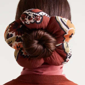 Coletero con forma de flor estampado Daisy