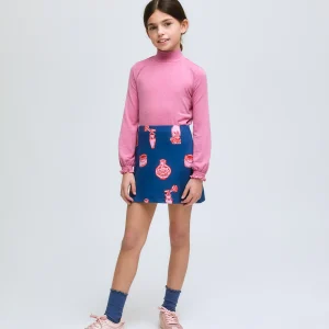 Jersey de niña rosa de cuello alto y puños fruncidos