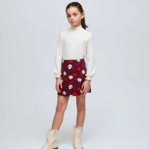 Falda corta de niña con estampado floral Tulip y cintura elástica.