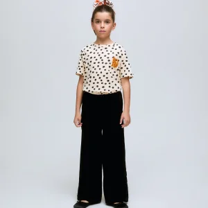 Camiseta de niña con estampado de lunares negros y leopardo