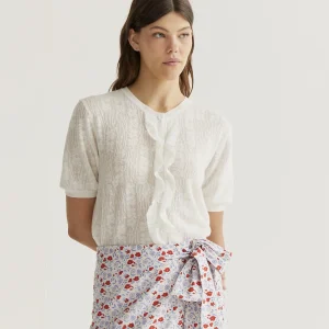 Cárdigan punto floral blanco con volantes