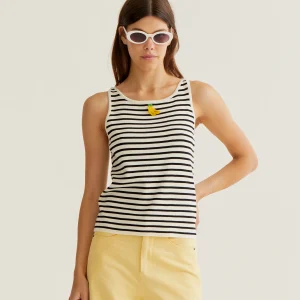 Top de rayas blanco y negro con bordado de banana