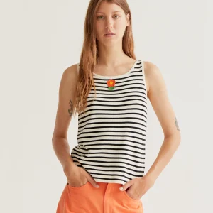 Top de rayas blanco y negro con bordado de flor