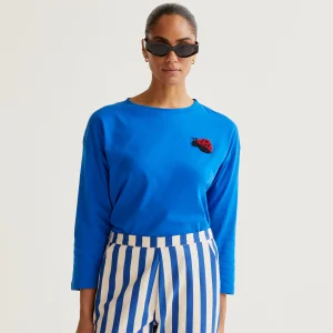Camiseta azul con bordado Coccinellidae